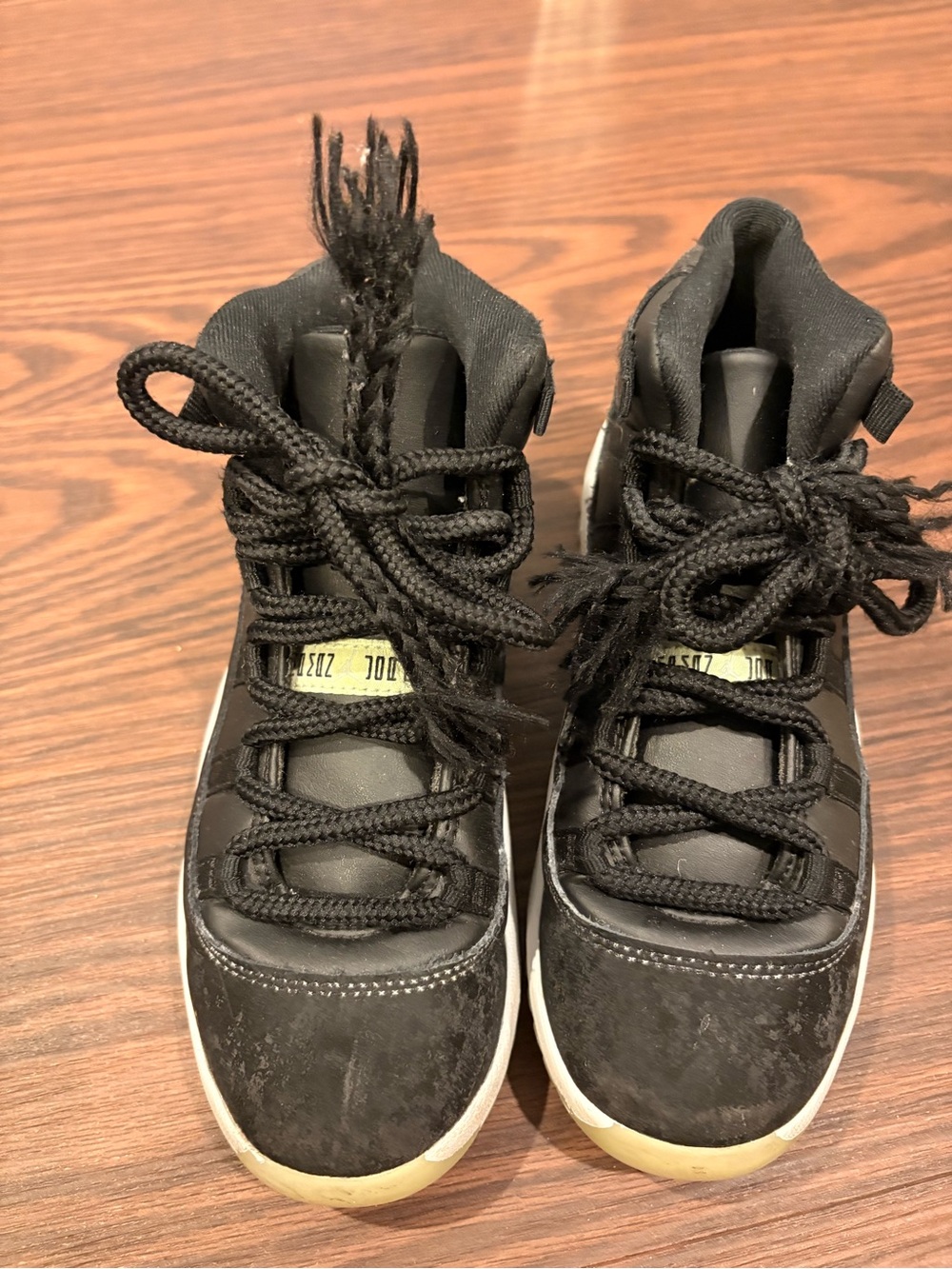 Jordan Kids Black and White High-Top Sneakers